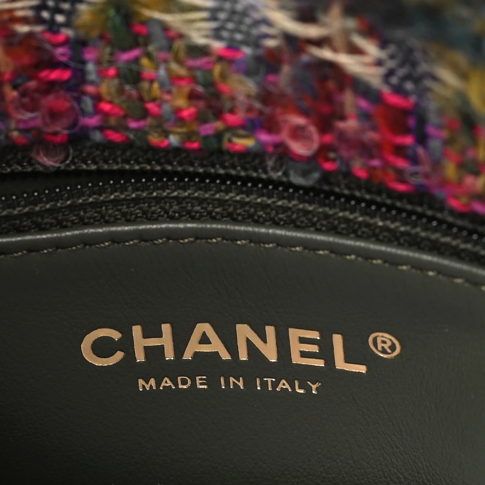 Close-up of the CC turn-lock and gold-tone chain-link hardware on the multicolor Ch@nel Small Flap Bag
