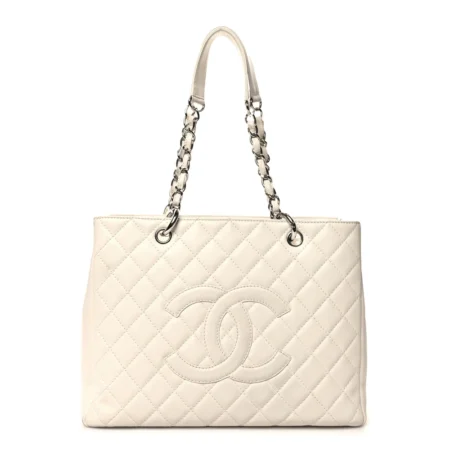 Front view of the white Ch@nel Grand Shopping Tote with stitched CC logo and silver-tone chain straps
