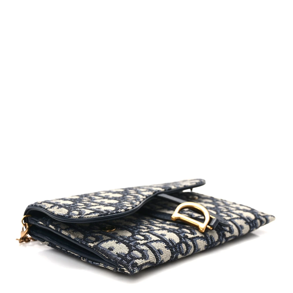 Bottom view of the blue Oblique monogram canvas D!0r Saddle Chain Long Wallet