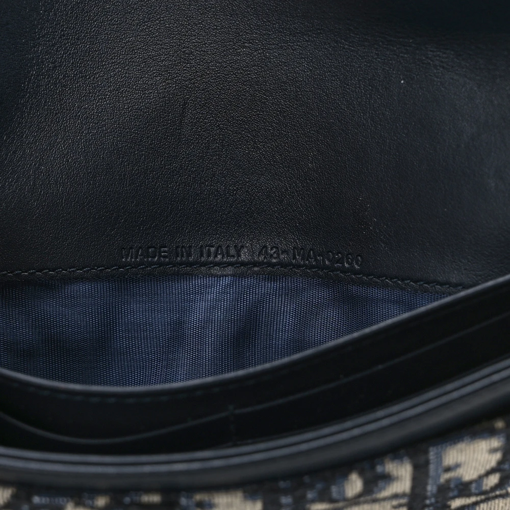 Interior view of the blue Oblique monogram Saddle Chain Long Wallet with card slots and compartments