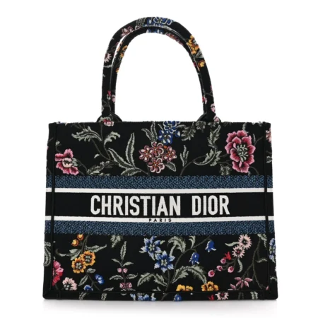 Front view of the natural raffia D!0r Medium Book Tote with multicolour floral motif