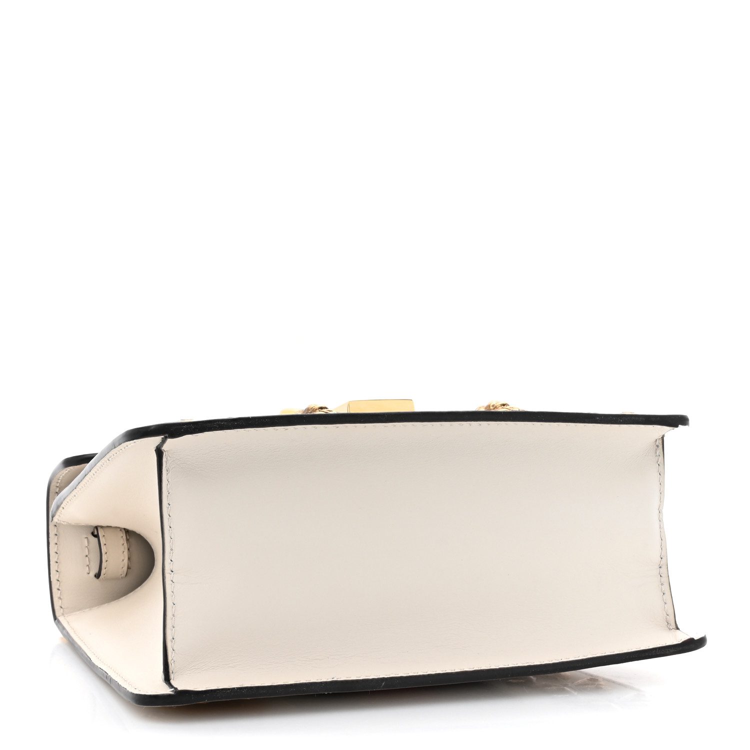 Bottom view of the white Gucc! Mini Sylvie Bag showing its structured base