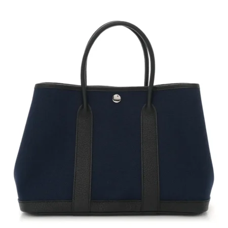 Front view of the Bleu Marine and Black Herme$ Garden Party 30 tote