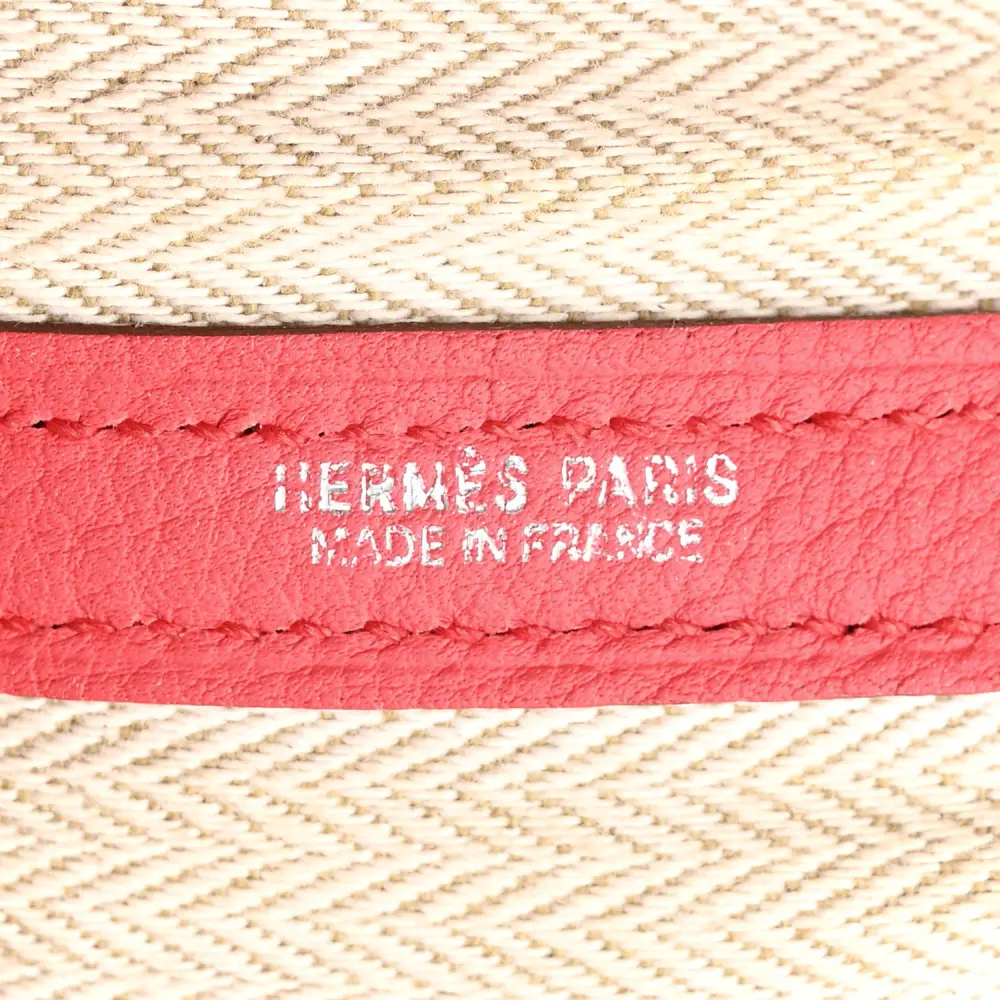 Close-up of the snap closures, leather texture, and refined hardware on the Bougainvillea Garden Party 36