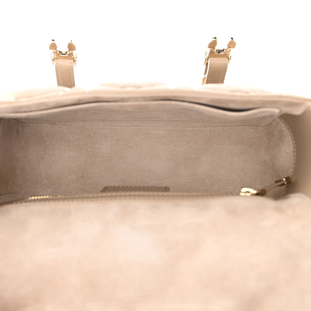 Interior view of the sand D!0r Diorcamp Messenger Bag with its main compartment
