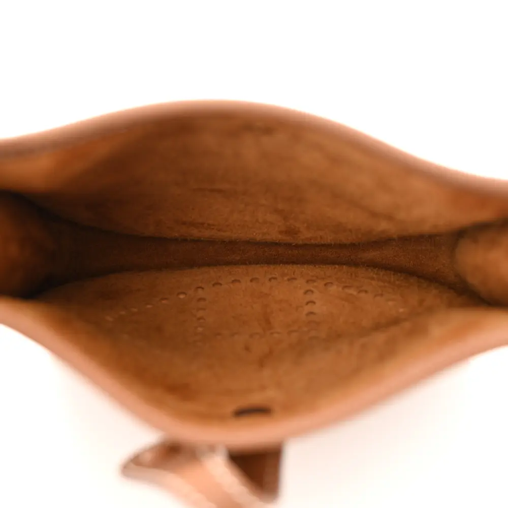 Interior view of the brown Taurillon Clemence Herme$ Evelyne TPM with its main compartment