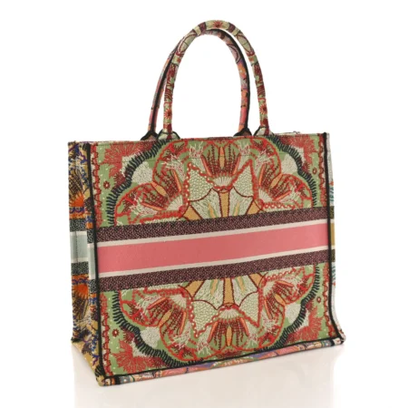 Front view of the D!0r large book Tote multicolor embroidered canvas with intricate vibrant designs