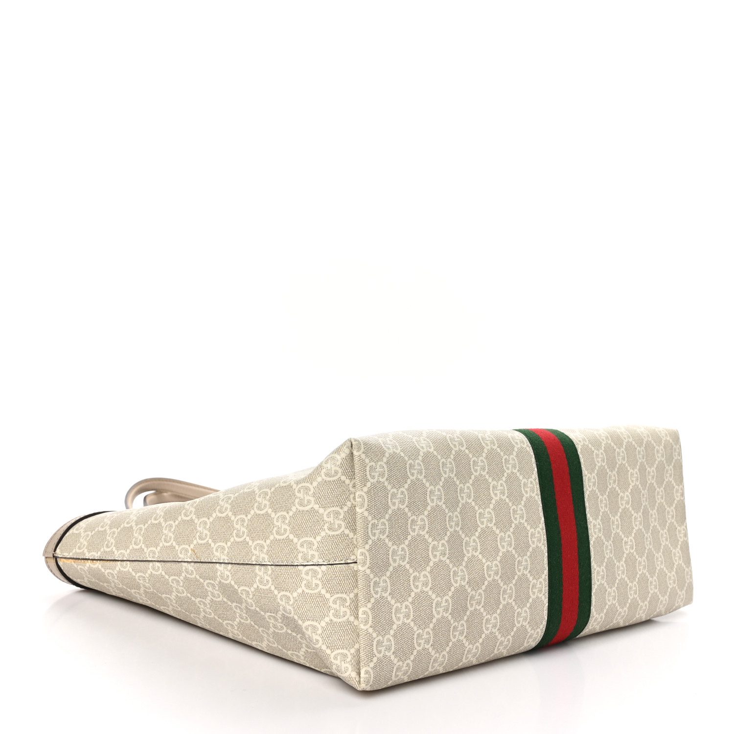 Bottom view of the Gucc! GG Supreme Ophidia Shopping Tote with green and red web stripe detail