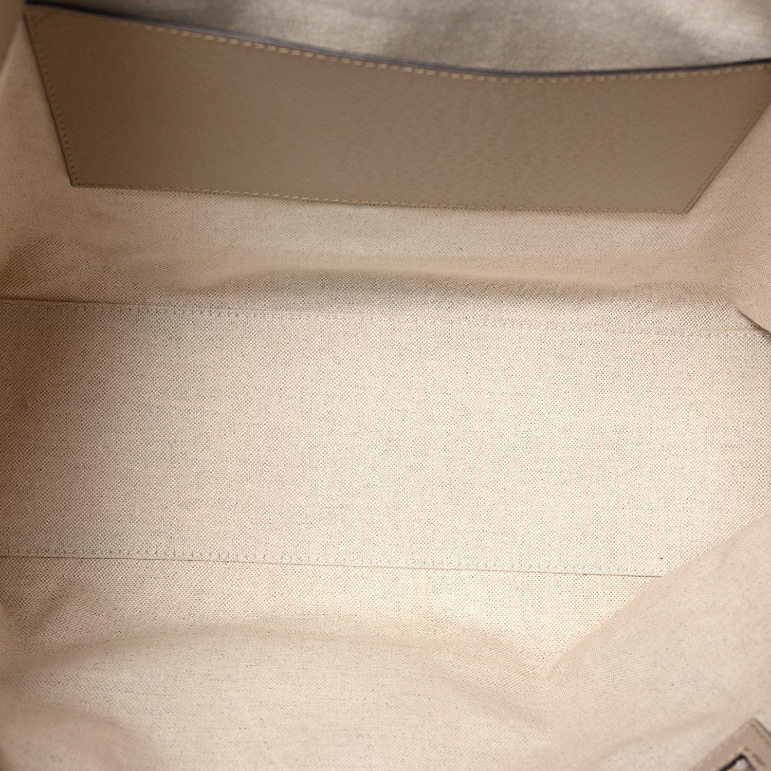 Interior view of the Gucc! GG Supreme Ophidia Shopping Tote showing its spacious storage compartment