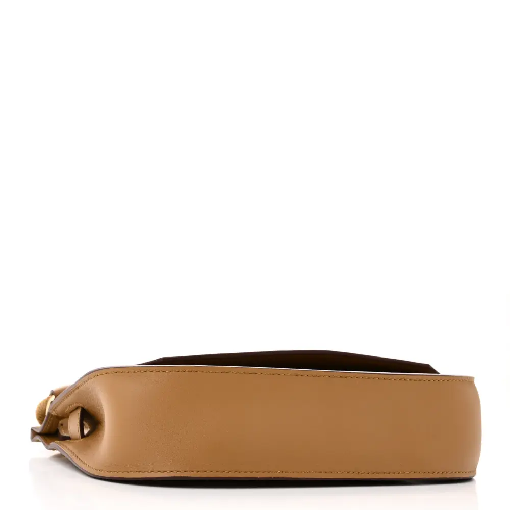 Bottom view of the Bronze Dore herme$ Mini Jypsiere shoulder bag