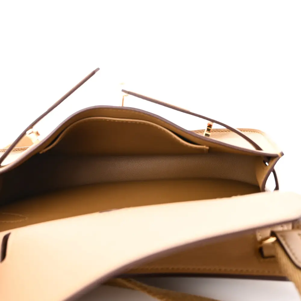 Interior view of the Bronze Dore herme$ Mini Jypsiere shoulder bag with its main compartment