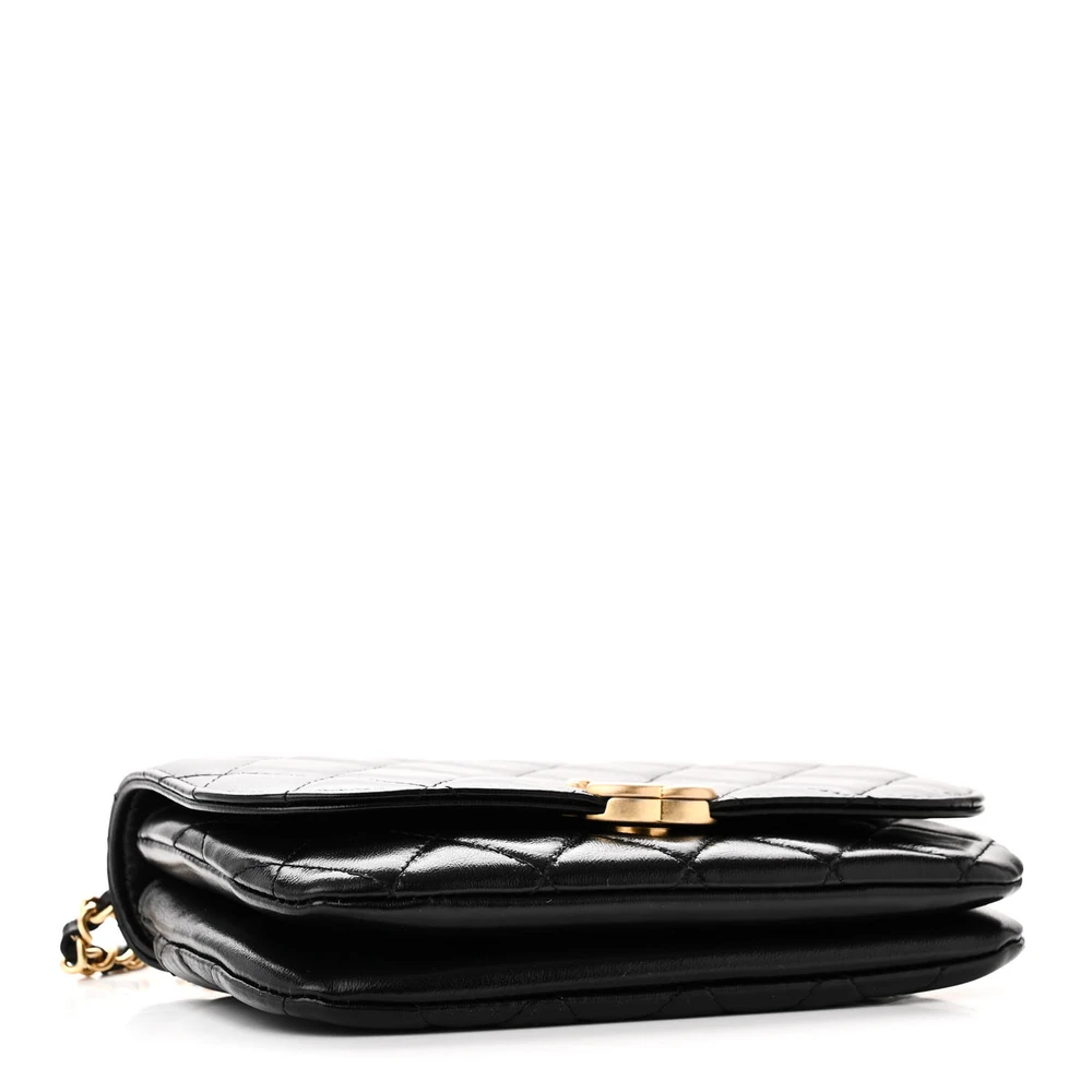 Bottom view of the black Ch@nel Flap Phone Holder with gold-tone chain strap and CC logo detailing