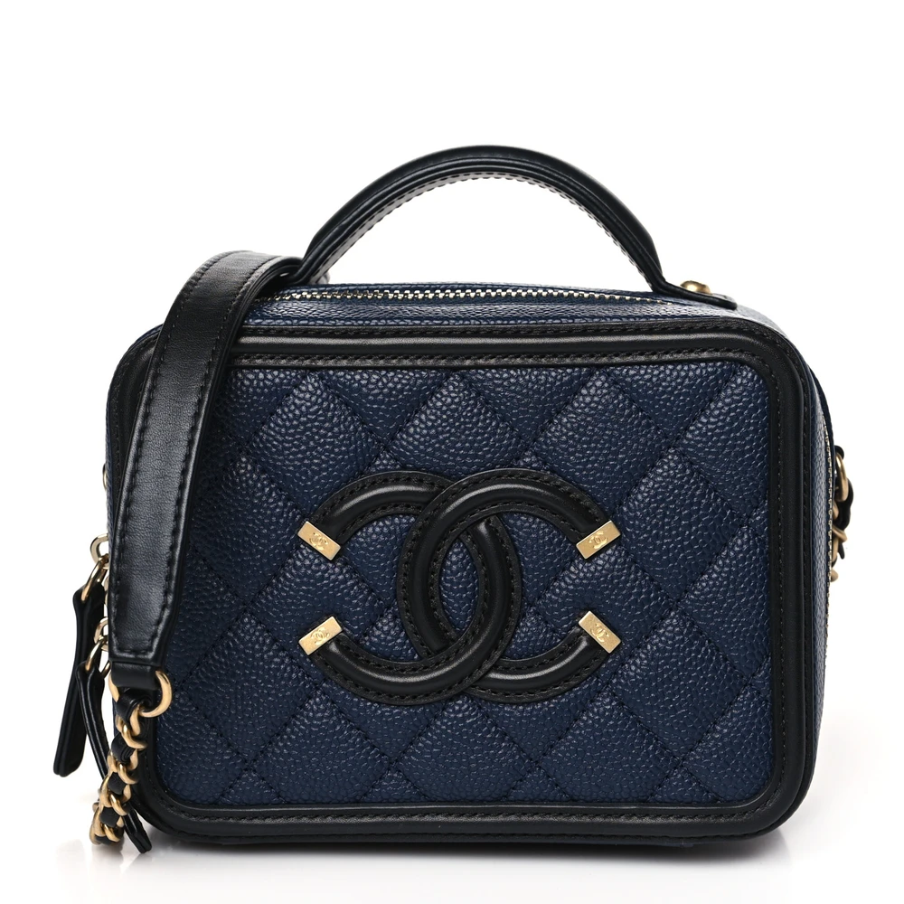 Front view of the navy Ch@nel Filigree Vanity Case with luxurious gold-tone chain strap