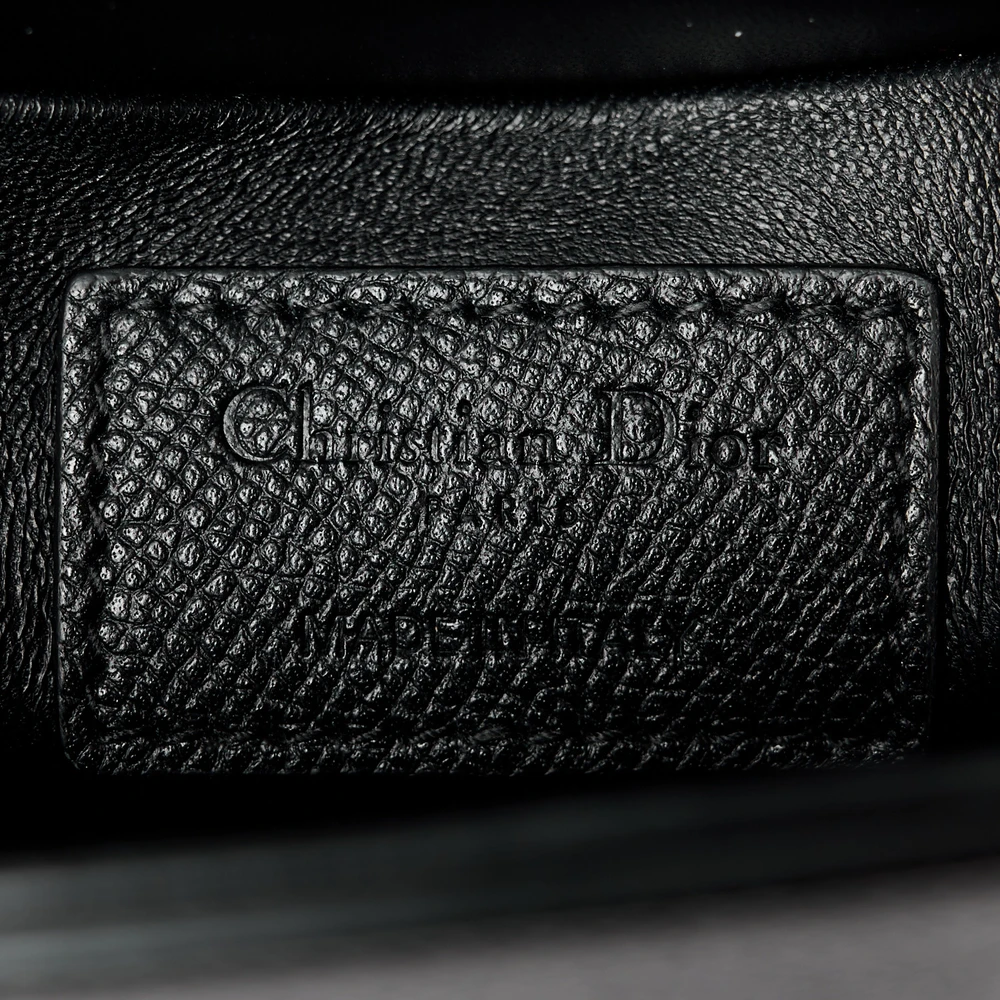 Close-up of the flap detailing, refined hardware, and grained leather finish on the black 30 Montaigne Box Bag