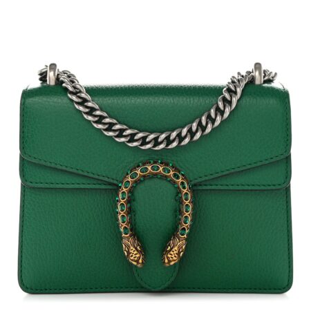 Front view of the emerald green Gucc! Mini Dionysus Shoulder Bag with aged gold-tone horseshoe closure