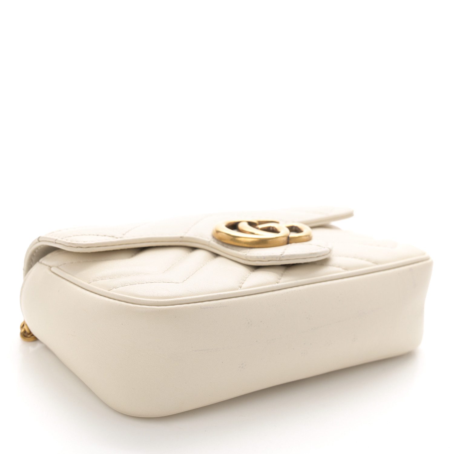 Bottom view of the white Gucc! Super Mini GG Marmont Shoulder Bag