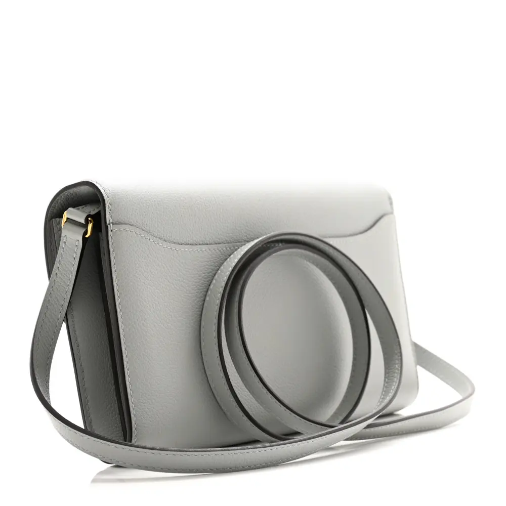 Back view of the Bleu Glacier Herme$ Constance Wallet To Go in Evercolor calf leather