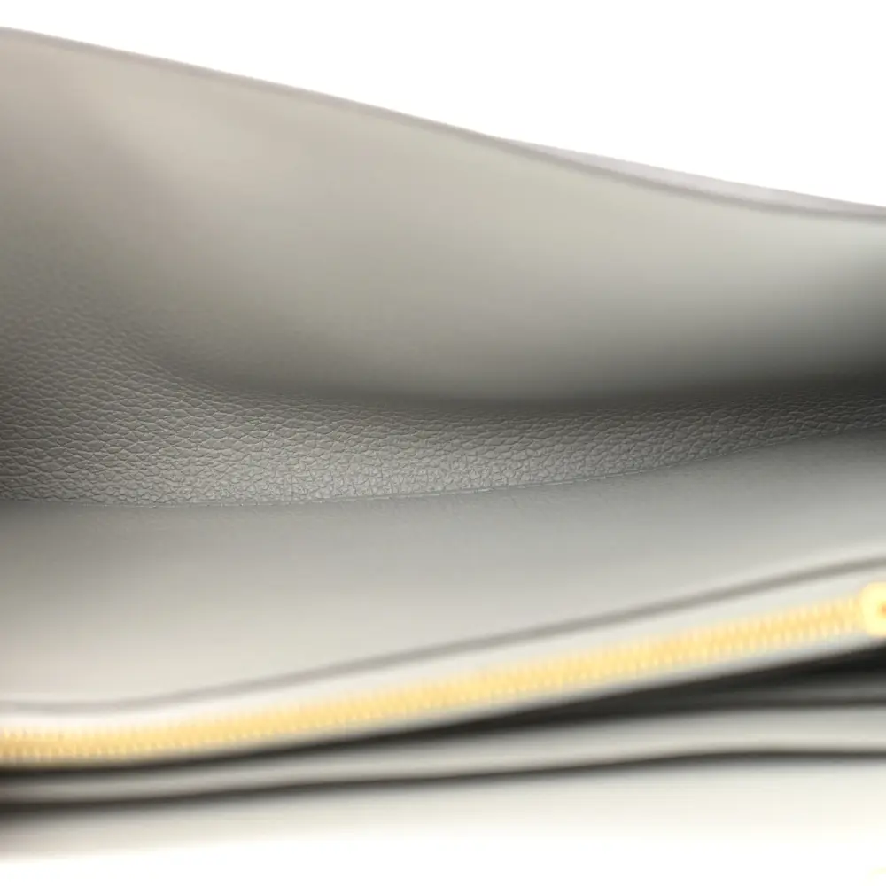 Interior view of the Bleu Glacier Constance Wallet To Go showing card slots and compartments