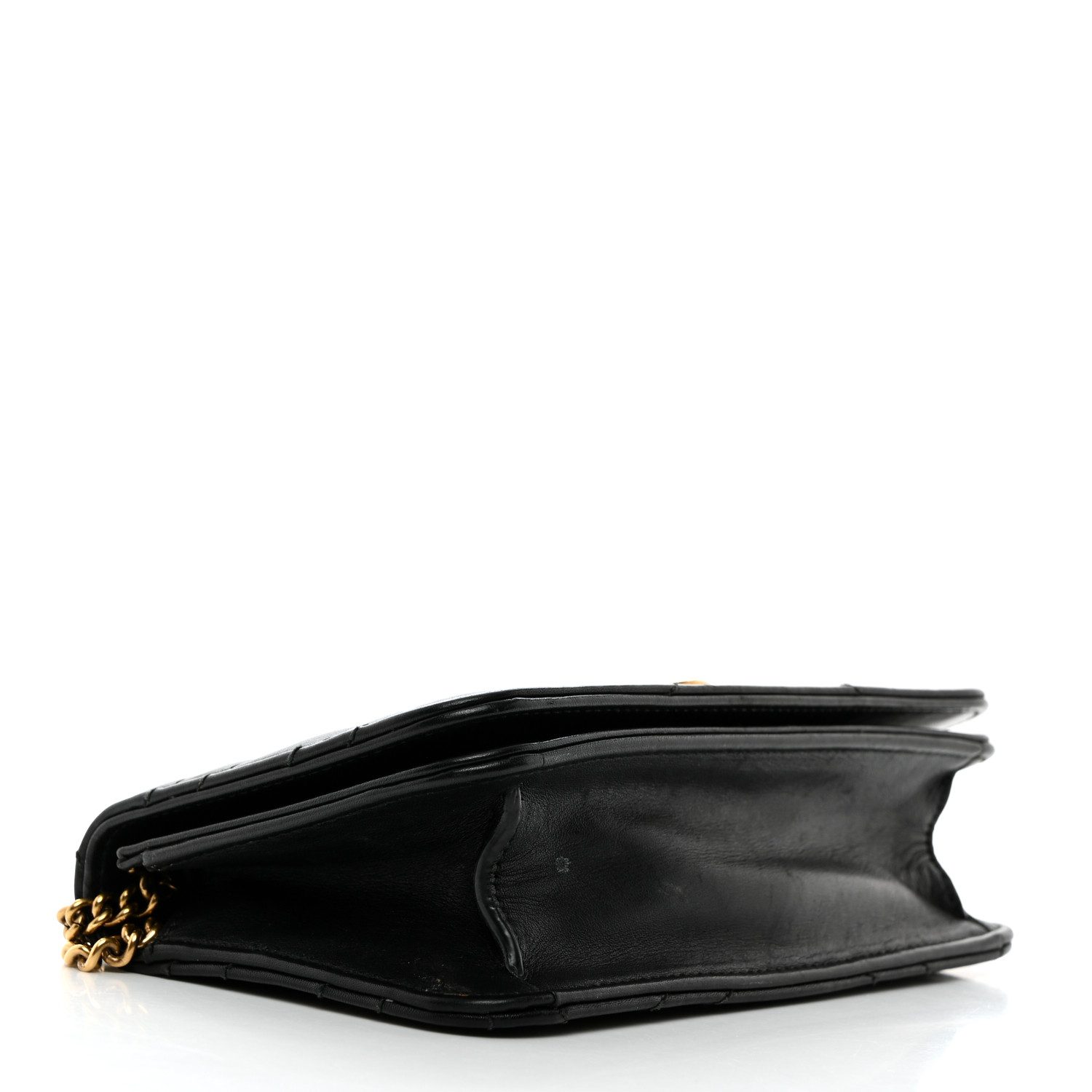 Bottom view of the black Gucc! GG Marmont Mini Bag with chevron quilting and interlocking GG logo