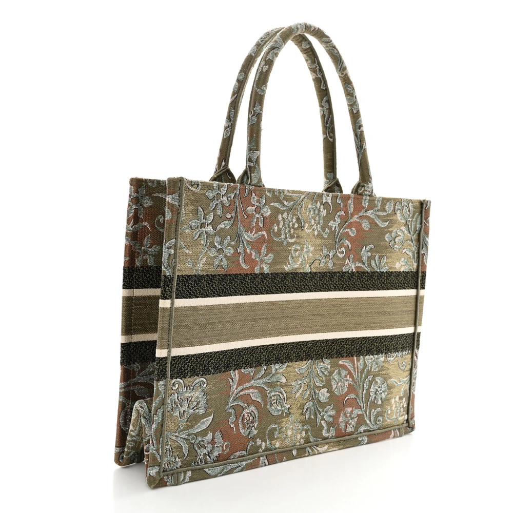 Back view of the metallic green D!0r Medium Book Tote with embroidered Dior PARIS signature
