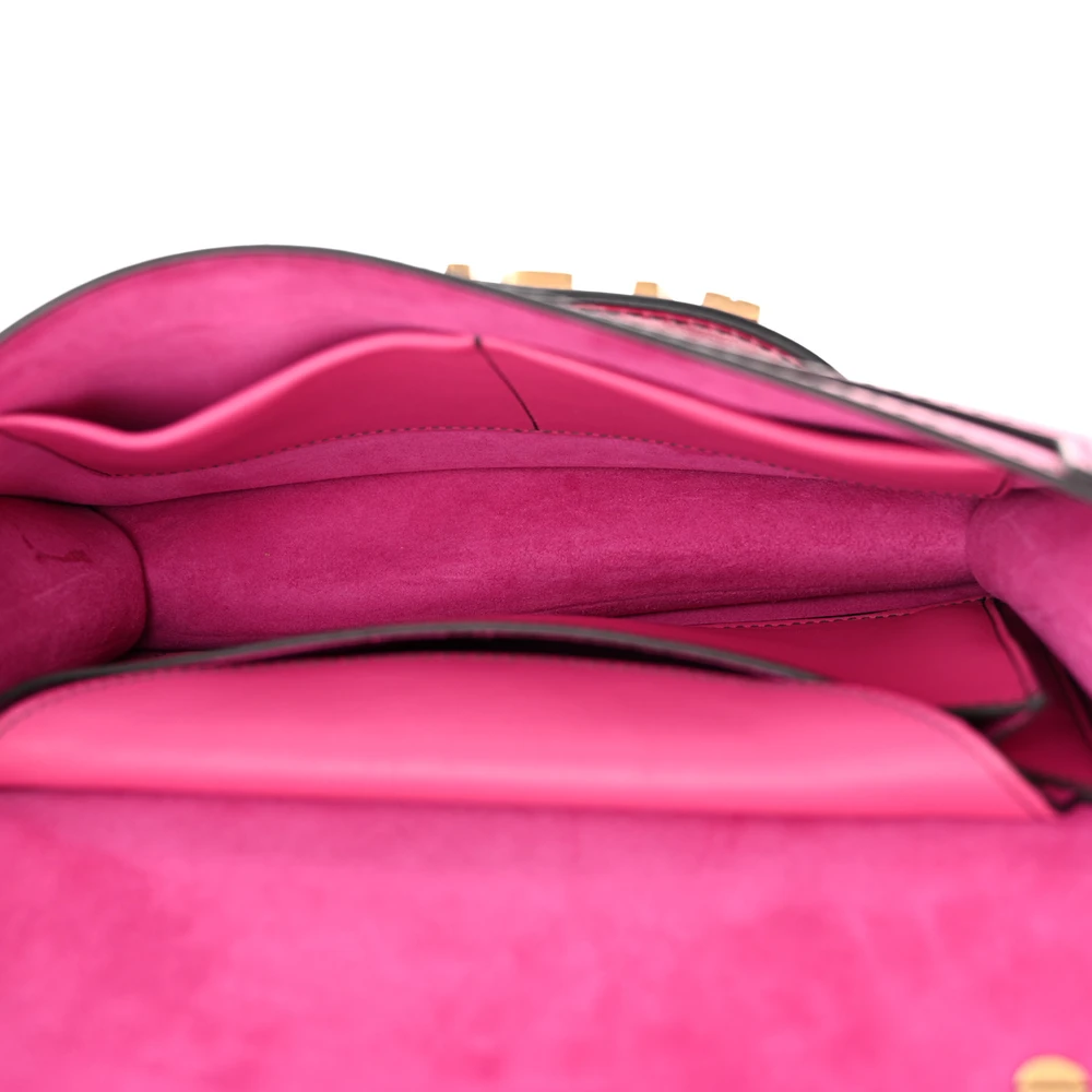 Interior view of the fuchsia D!0r J’Adior Chain Flap Bag with organised storage for essentials
