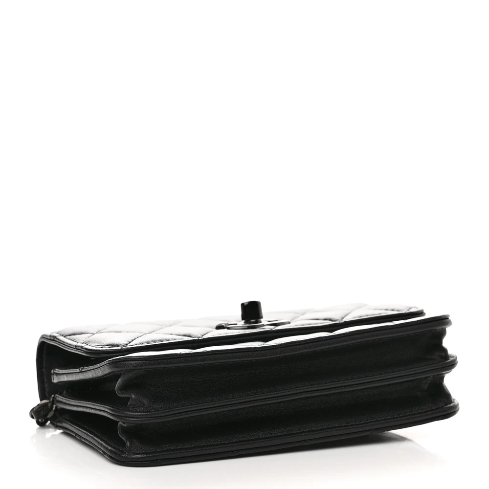 Bottom view of the black quilted Ch@nel Mini Wallet on Chain with Black-tone hardware