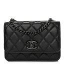 Front view of the black quilted Ch@nel Mini Wallet on Chain with Black-tone hardware