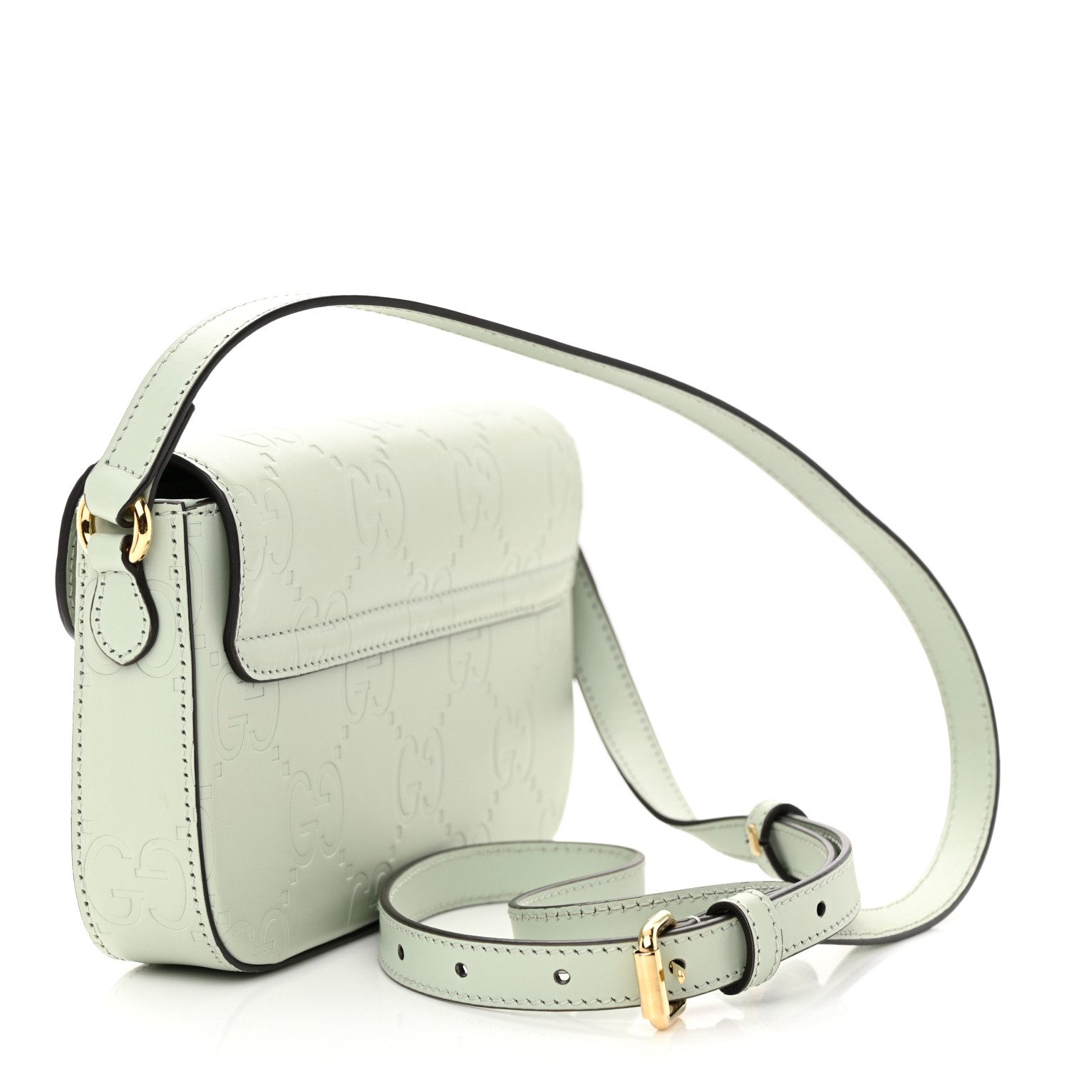 Bottom view of the pale green Gucc! GG Super Mini Shoulder Bag with embossed GG detailing