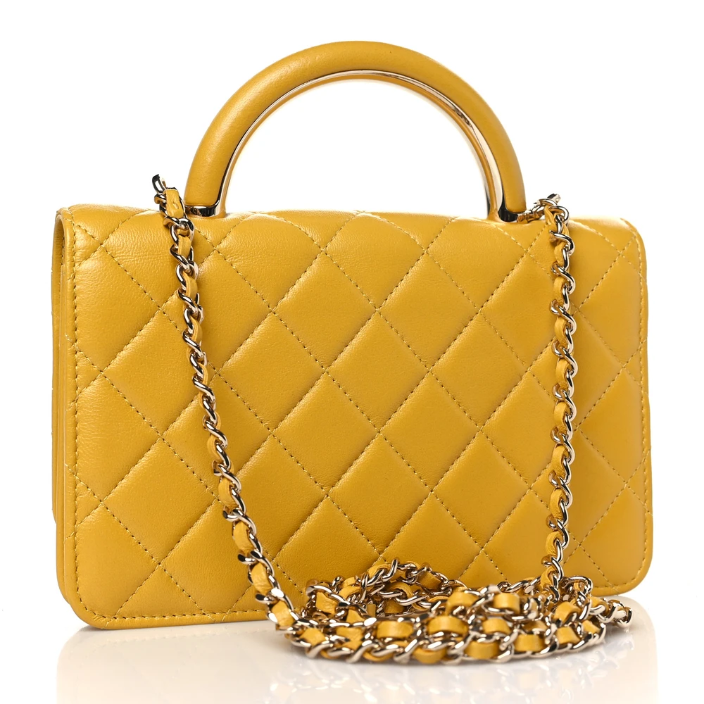 Back view of the yellow Ch@nel Wallet on Chain bag with CC detail and top handle