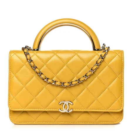 Front view of the yellow Ch@nel Wallet on Chain bag with CC detail and top handle