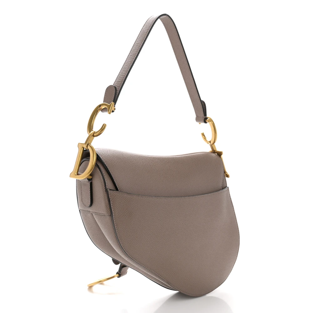Back view of the warm taupe Replica Dior Medium Saddle bag with curved silhouette