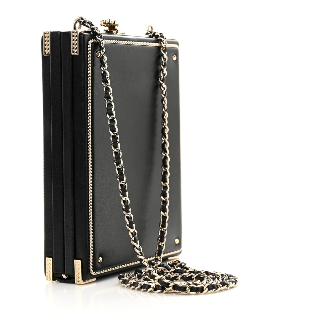 back view of the black Ch@nel Room Card Minaudiere bag with textured kiss-lock closure