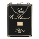 Front view of the black Ch@nel Room Card Minaudiere bag with textured kiss-lock closure