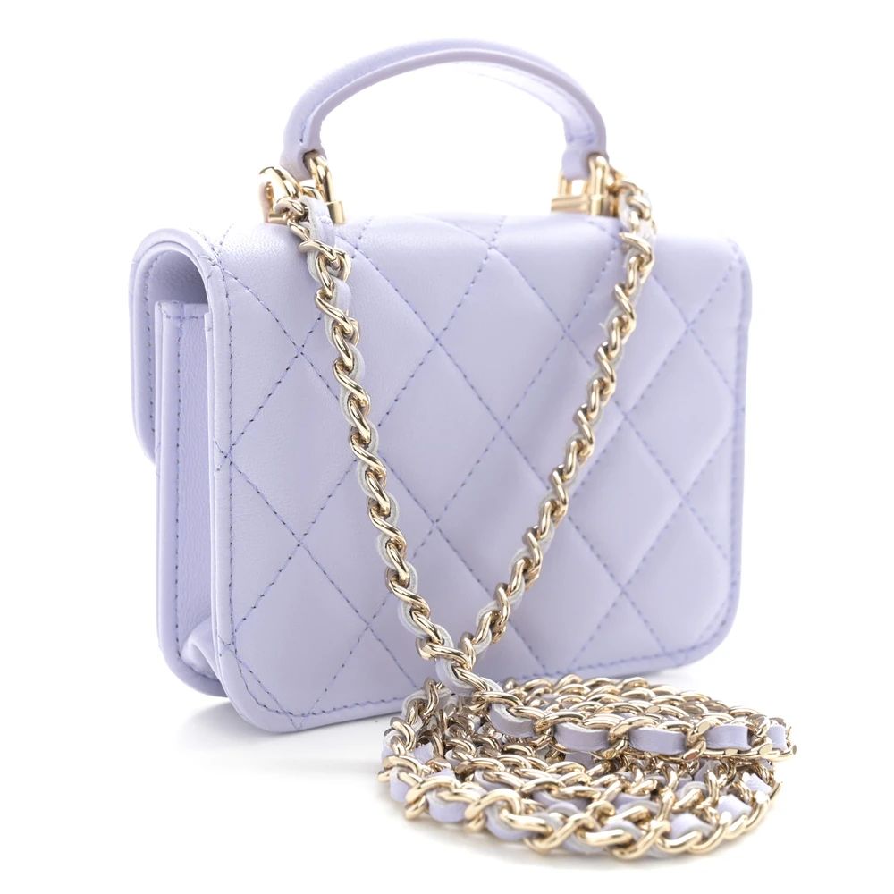 Back view of the light purple Ch@nel Top Handle Coin Purse bag with CC closure