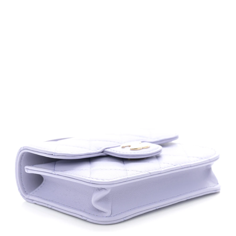 Bottom view of the light purple Ch@nel Top Handle Coin Purse bag with CC closure