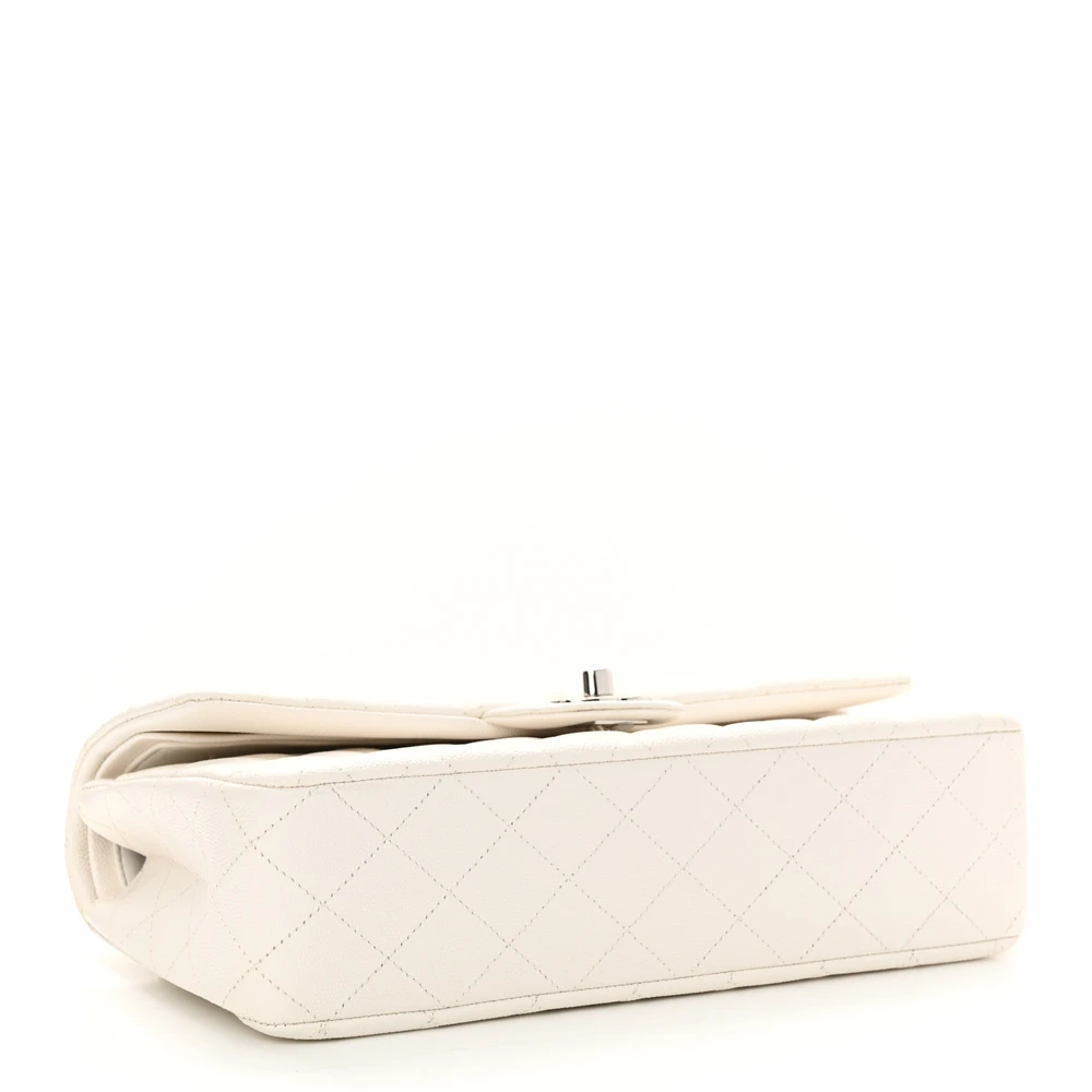 Bottom view of the Superfake white Ch@nel Medium Double Flap bag with quilted leather exterior