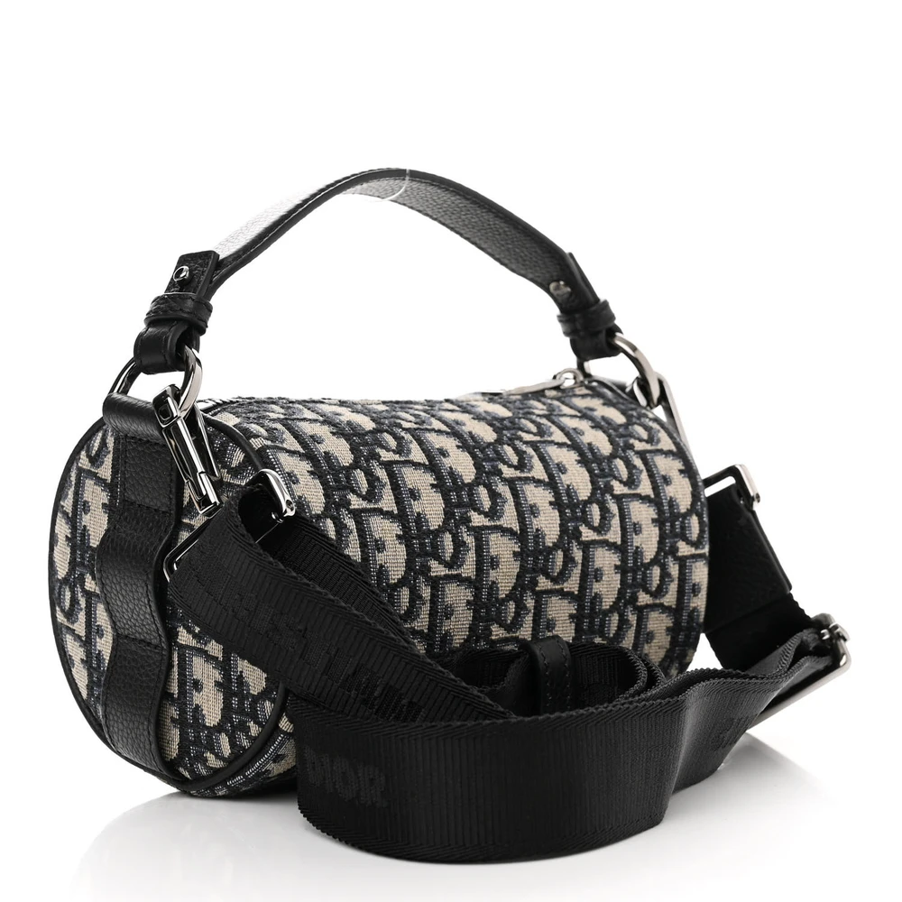 Back view of the blue D!0r Mini Roller Messenger Bag with Oblique monogram canvas