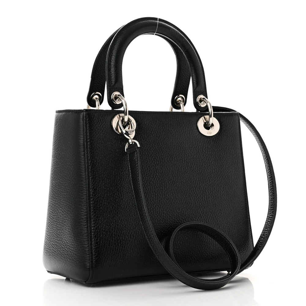 Back view of the dark green D!0r Medium lady bag with white floral print and Dior charm