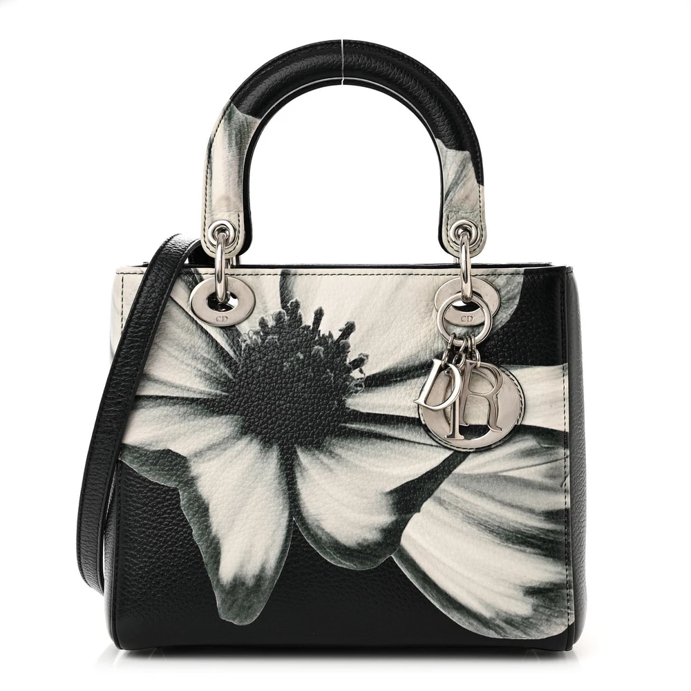 Front view of the dark green D!0r Medium lady bag with white floral print and Dior charm
