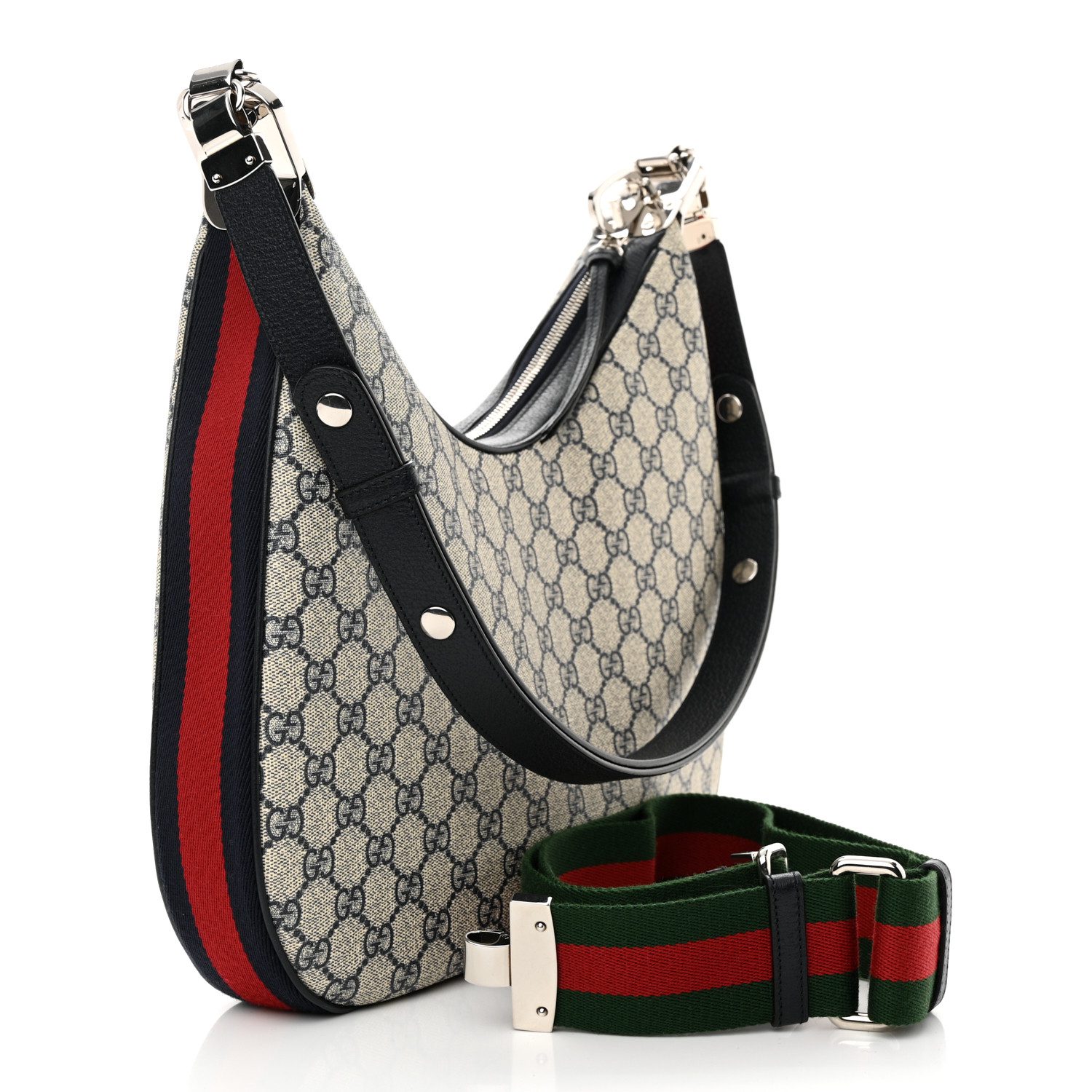 Back view of the Gucc! Attache Large Shoulder Bag with beige monogram canvas, blue leather detailing, and G-shaped hook closure