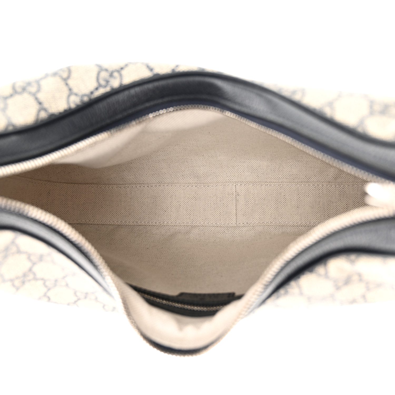 Interior of the Gucc! Attache Large Shoulder Bag with beige fabric lining and zipper pocket
