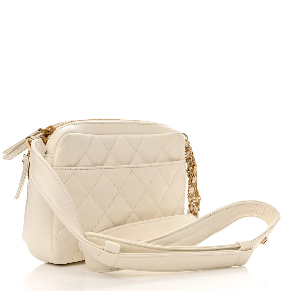 Back view of the superfake white Ch@nel Camera Case bag with front pocket and CC detail