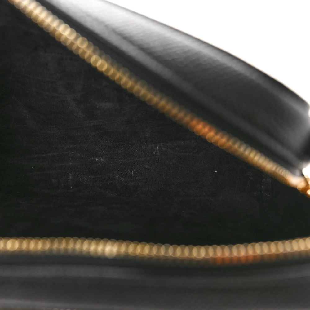 Interior view of the black D!0r Caro Double Pouch with black suede lining