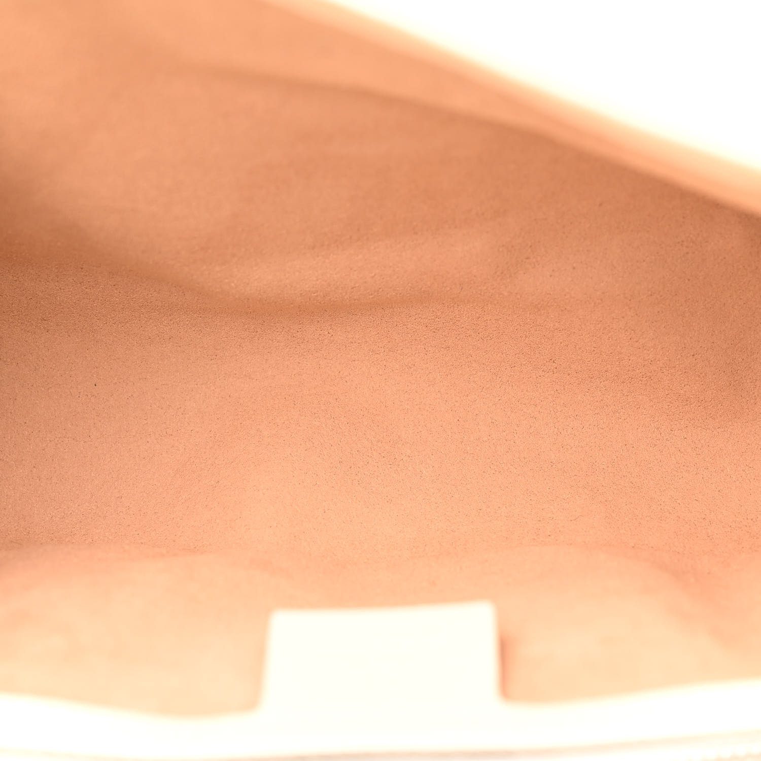 Interior of the blue Gucc! GG Marmont Small Shoulder Bag with beige microfiber lining and patch pocket